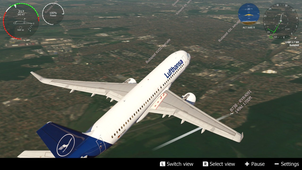 Aerofly FS: an A320 over the Budapest suburbs with another plane's label in the distance