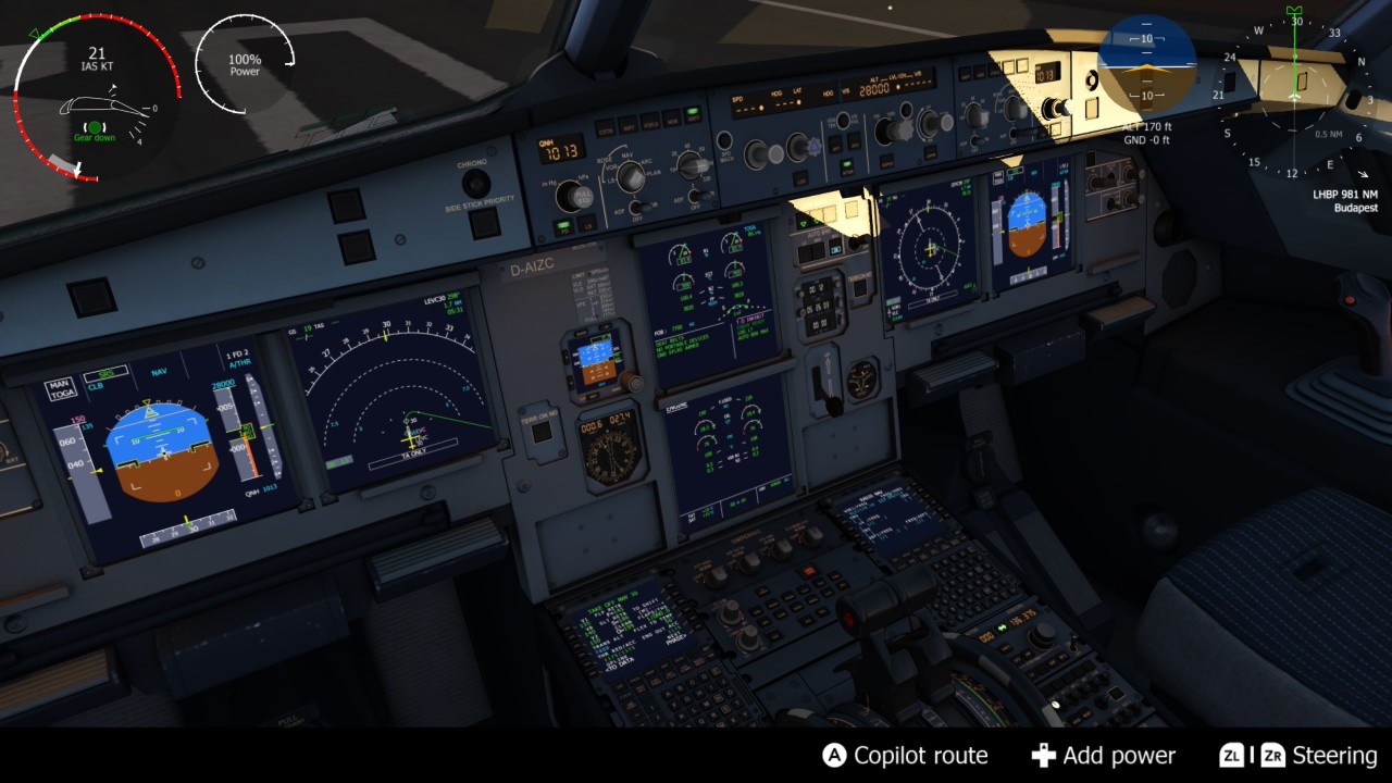Aerofly FS: the A320 cockpit with its screens and overhead panel at dusk
