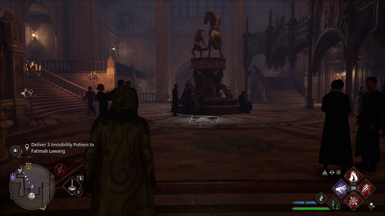 Hogwarts Legacy: a student in the entrance hall near a unicorn fountain and wide staircases