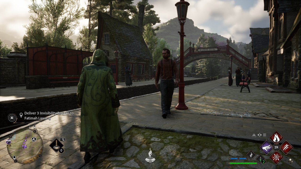 Hogwarts Legacy: a student walking through the sunny station area in Hogsmeade