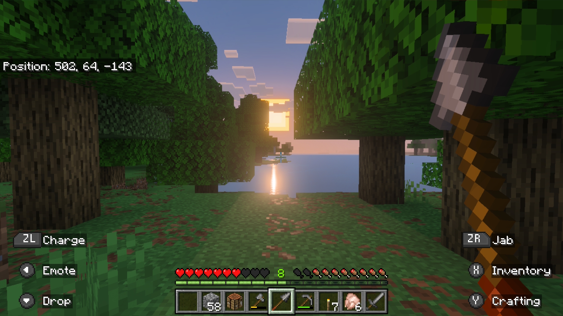 Minecraft: sunset over a lake between two big oak trees