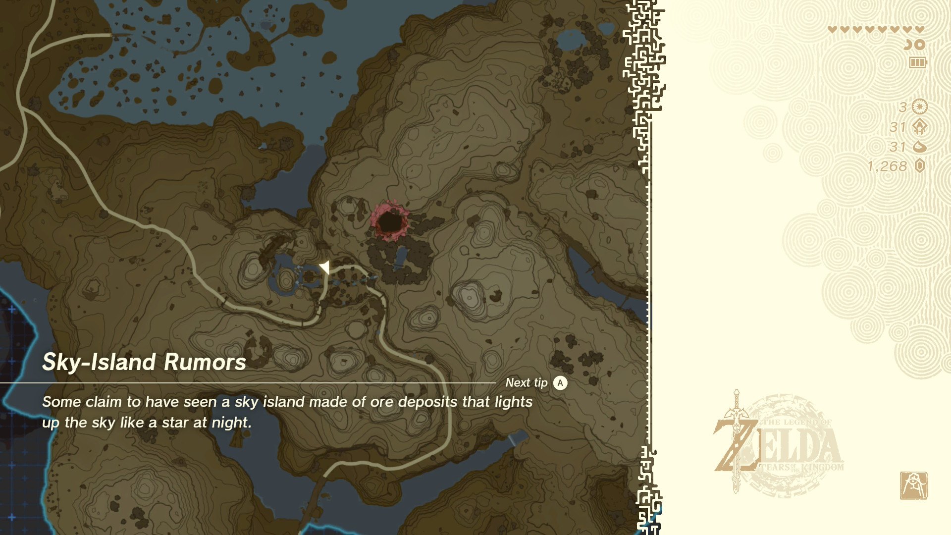 The loading screen sneaks in a tip. Sky-island rumours, free of charge.